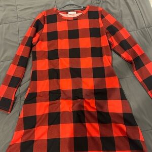 Red and black checker knee length dress. Long sleeve top of the dress Size Large